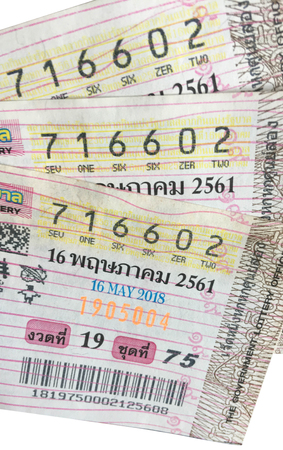 Thailand,May 16,2018 Thailand Lottery for the period May 16, 2561 on white background .and Buy a lottery ticket from a market in Skonnakorn.の写真素材