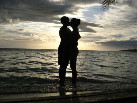 Kissing couple in front of the の写真素材