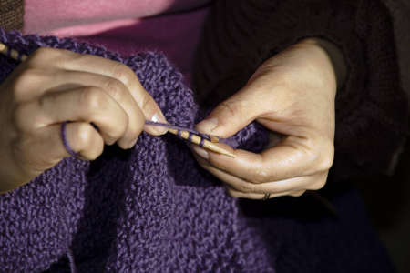 Close up of hands knittingの写真素材