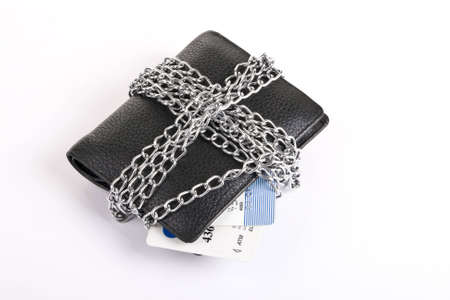 wallet and credit card tied with chain on white backgroundの写真素材