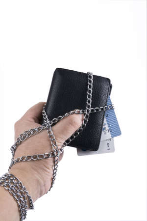hand  wallet and credit card tied with chain の写真素材