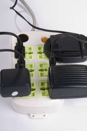 Connected electric outlet on white background