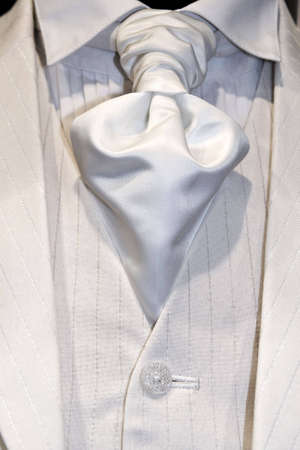 A modern tie and a white shirt and suit 