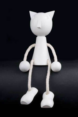 white puppet on black backgroundの写真素材