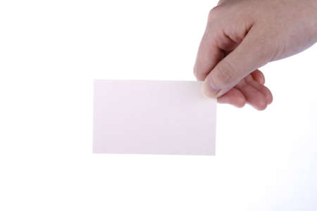 young female hand holding a white business cardの写真素材