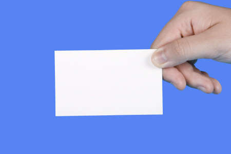 young female hand holding a white business card
