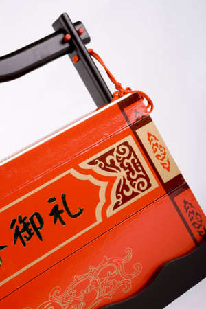 Box with a gift on a white backgroundの写真素材