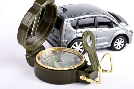 compass and car on a white background