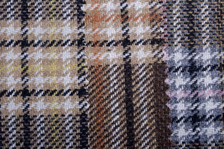 Has the textured tartan plaid background