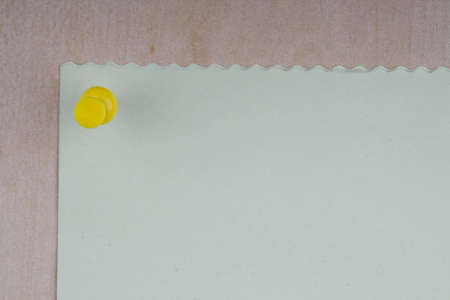 Blank note on a board with a tackの写真素材