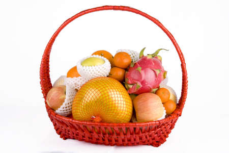 Fruit basket with mixed fruit on white background