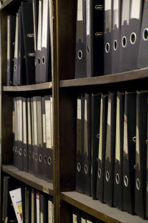 archive file folders in office cabinet の写真素材