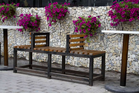 beautiful fence of a outdoor dining room with flowersの写真素材