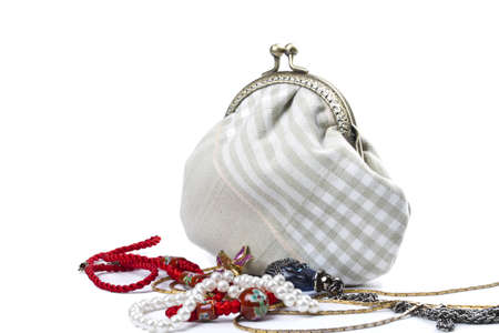 The handwork does bag and  jewelry isolated on white の写真素材