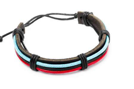 leather arm bracelet isolated on white background の写真素材