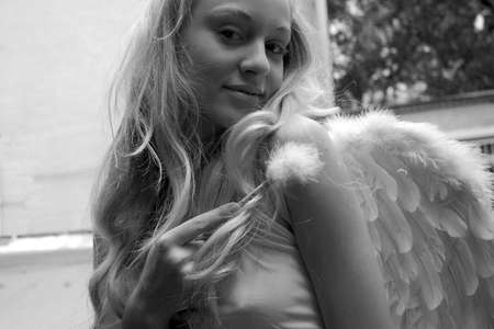 girl, woman, young, angel, wings, feather, white, magic, romanticism, religion, image, beauty, tenderness, innocence, serenity, cleanliness, fly, afterlife, alone, magic stick, attractive, blond, body, bright, calm, erotic, female, fit, fluff, fluffy, gooの写真素材