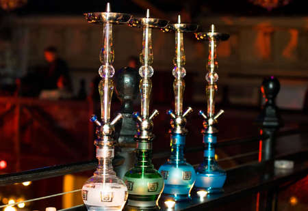 view of hookah detail under neon light
