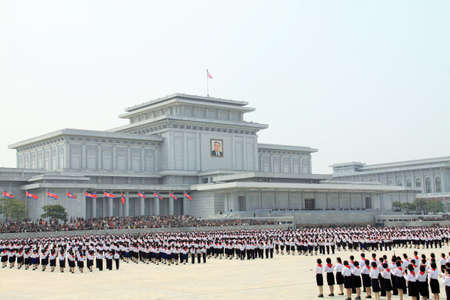 Pyongyang, North Korea - Apr 15,2010: A gathering of students in front of Kumsusan Palace of the Sun...