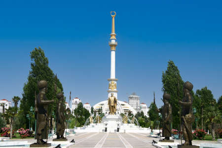 Ashgabat, Turkmenistan - May 20, 2007: Independence Monument of Turkmenistan and the golden statue of Niyazov in the frontのeditorial素材