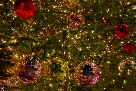 Sparkling illuminated Christmas tree ornamentsの写真素材