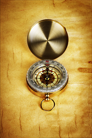 Compass on vintage old paper backgroundの写真素材