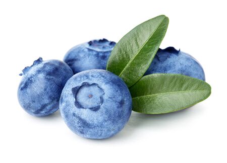 Blueberries with green leaves isolated on whiteの写真素材