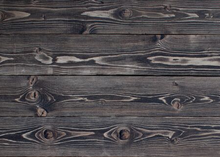 Boards are old oak with natural  pattern brown weathered dark rustic wood texture - tree background. wooden surface for add text or design decoration art workの写真素材