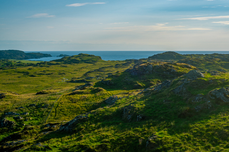 View Over Fields to the Sea in Summer on the Island of Iona in Scotlandの写真素材