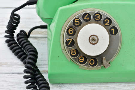 old rotary dial phone, green colorの写真素材