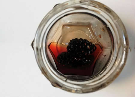 Pine cone jam in a glass jar top view