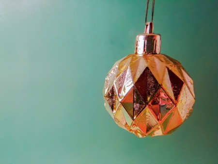 yellow toy christmas toy with water dropsの写真素材
