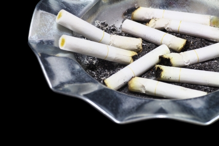 Many cigarettes and ashtrayの写真素材