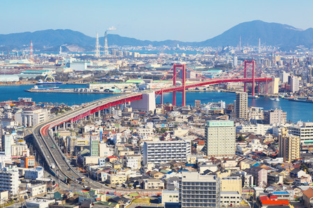 KITAKYUSHU, JAPAN-FEB 10: View of Kitakyushu City with Wakato Bridge on Feb 10, 2016 in Kitakyushu, Japan. With 960000 inhabitants Kitakyushu is the second largest city in kyushu.のeditorial素材