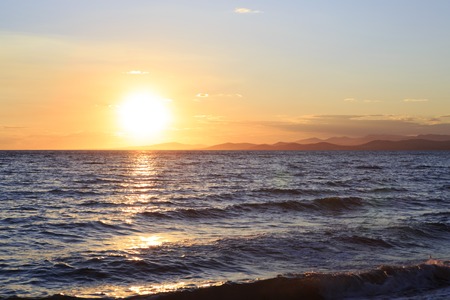 Huge sun sets in the Aegean Sea. Sithonia peninsula. Greece.の写真素材