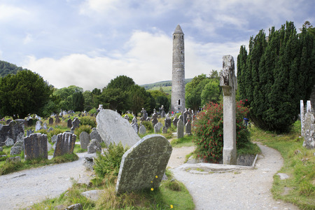 Celtic cemetery and a round tower in Wicklow Mountains National Park.の写真素材