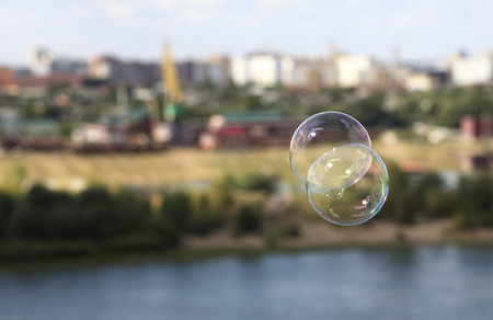 Bubbles on the background of the urban landscape.