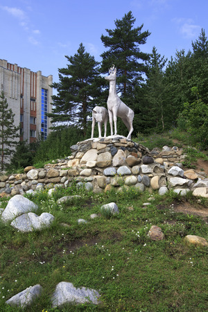 Belokurikha, Russia - August 06, 2013: Sculpture of deer in the resort Belokuriha.のeditorial素材