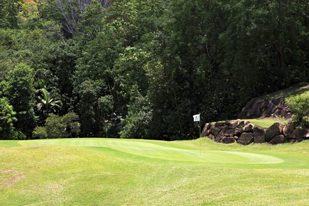Praslin Island, Seychelles - March 10, 2015: Beautiful golf course at the Constance Lemuria Resort.のeditorial素材