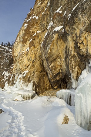 Grottoes and icicles on the rocks. Beautiful winter landscape in the Lake Baikal.の写真素材