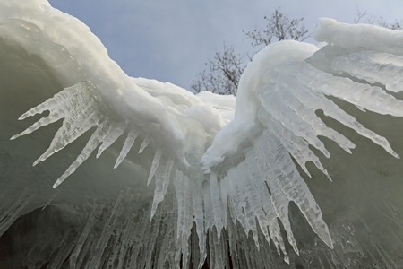 Beautiful icicles on rocks. Winter landscape in the Lake Baikal.の写真素材