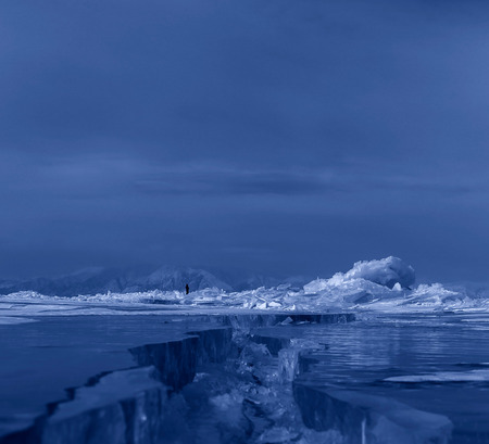 Large cracks on surface of the ice. Beautiful winter landscape in the Lake Baikal.の写真素材