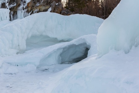 Snow caves of ice. Beautiful winter landscape in the Lake Baikal.