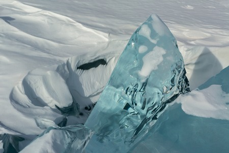 Huge blocks of ice. Beautiful winter landscape in the Lake Baikal.