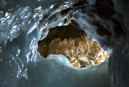 Ice Hole in the grotto. Beautiful winter landscape in the Lake Baikal.の写真素材