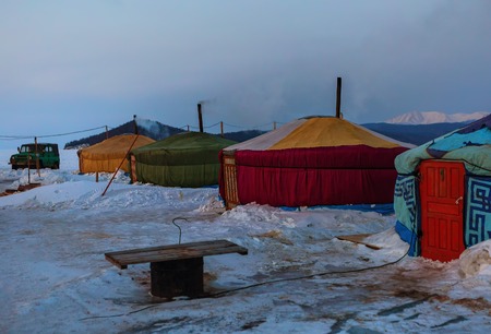 Baikal, Russia - March 08, 2016: Seasonal village of yurts for fishermen on the ice in the Lake Baikal.のeditorial素材