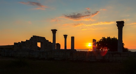 Ancient Greek basilica and marble columns in Chersonesus Taurica on the sunset background. Sevastopol, Crimea. Russiaの写真素材
