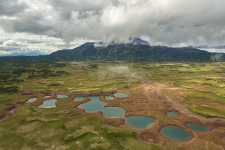 Uzon Caldera in Kronotsky Nature Reserve on Kamchatka Peninsula. View from helicopter.の写真素材