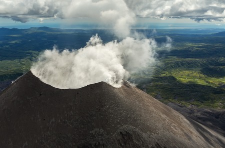 Karymsky is an active stratovolcano. Kronotsky Nature Reserve on Kamchatka Peninsula. View from...