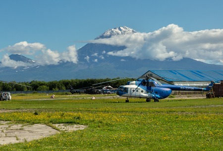 Yelizovo, Russia - August 12, 2016: Helipad on background Koryaksky volcano in Kamchatka Peninsula.のeditorial素材
