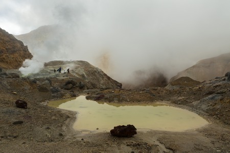 Mud bath in the crater of Mutnovsky volcano.の写真素材